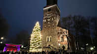 Turku Cathedral lit up against a dark sky.