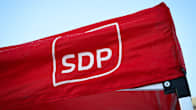 The SDP logo in white printed on a red flag.