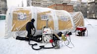 Lämmitetty teltta kerrostalon pihalla Kiovassa.