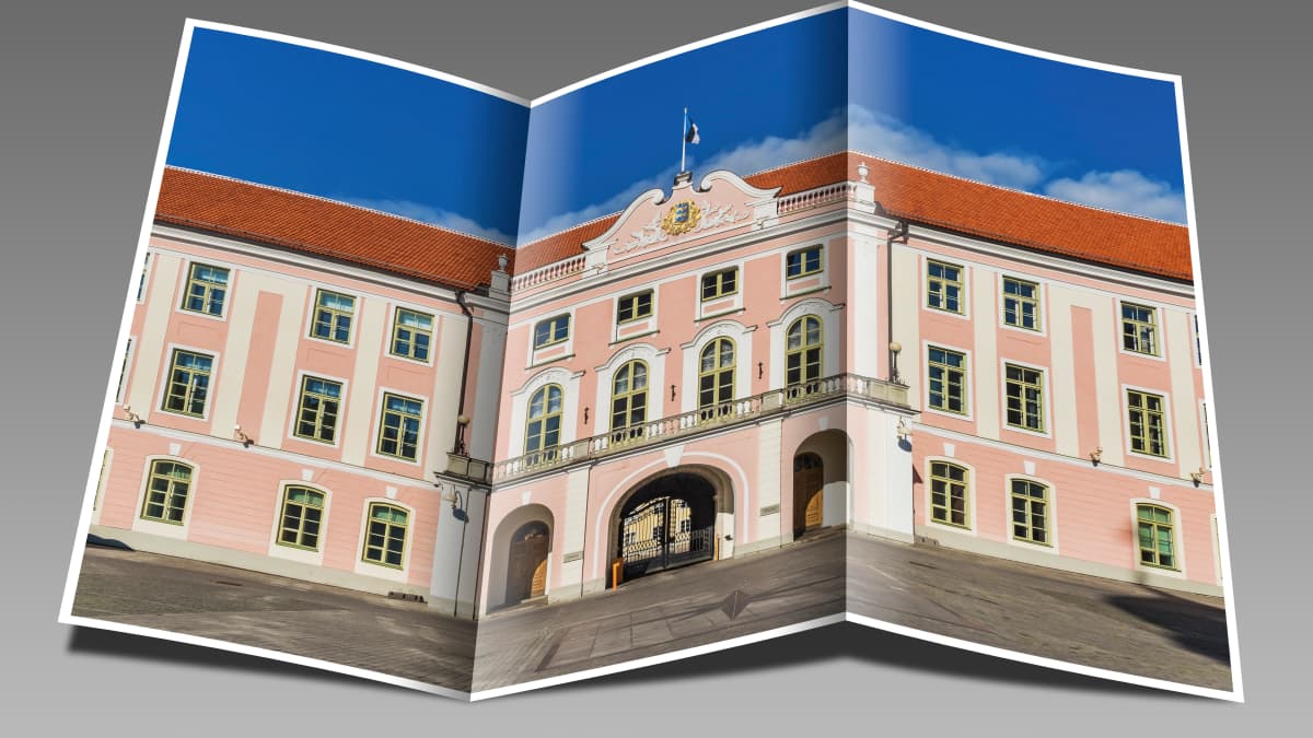 Viron vaaleanpunainen parlamenttitalo kuvassa, joka on taiteltu laskoksille.