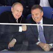 Vladimir Putin och René Fasel under VM-finalen 2016.