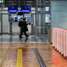 A photo showing a passport checkpoint in the Helsinki Airport.