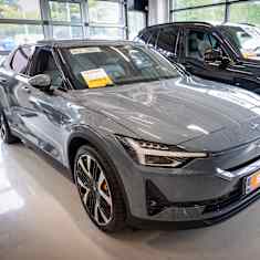 A Polestar 3 EV in a dealer showroom.