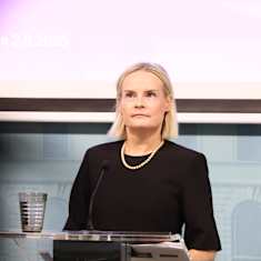 Photo shows Finance Minister Riikka Purra speaking to the media on Tuesday evening.