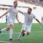 Espanjan Aymeric Laporte ja Koké juhlimassa 2–0-maalia Slovakiaa vastaan.