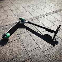Photo shows a scooter on the ground.