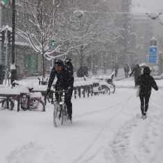 A cyclist braves the winter storm in downtown Turku.