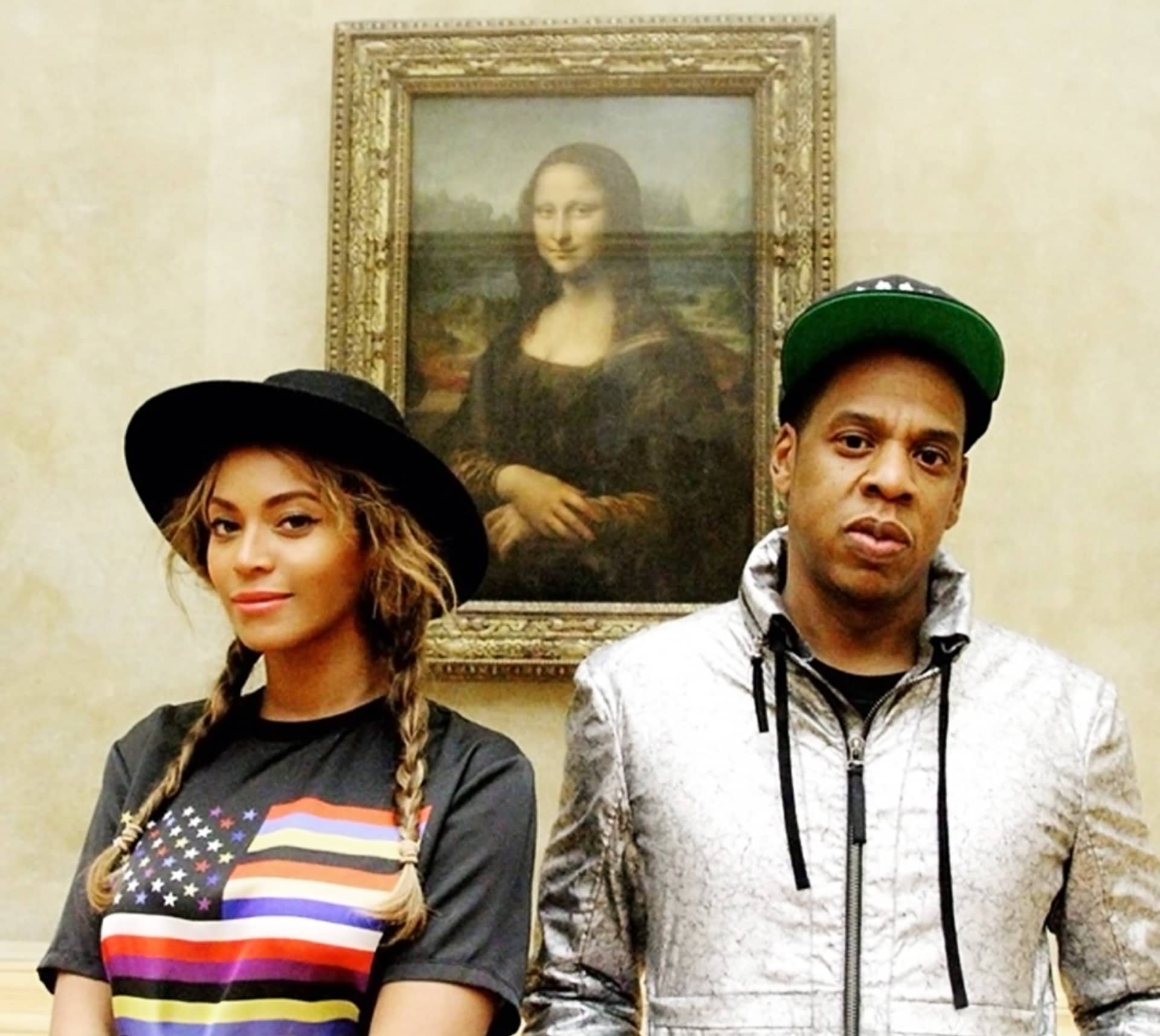 Beyoncé ja Jay-Z Leonardon Mona Lisan edustalla.