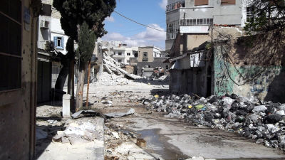 Våldet fortsätter i nedbombat Homs