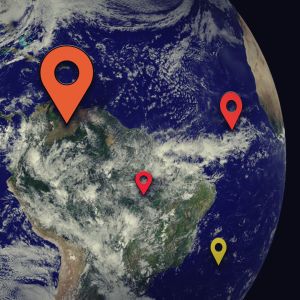 Maapallo NASA:n satelliittikuvassa, päällä Google Mapsin paikkakuvakkeita.