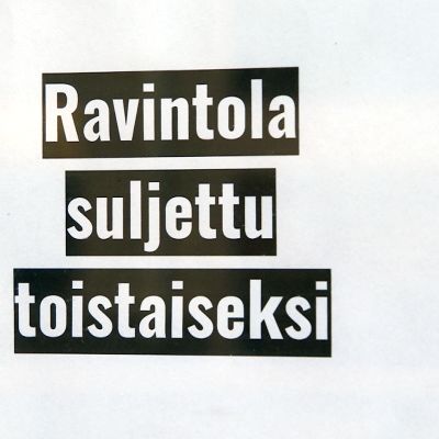 Ravintola suljettu toistaiseksi -lappu.