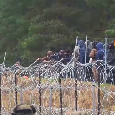 Siirtolaisia Valko-Venäjän ja Puolan rajalla