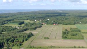 Taktom är ett naturligt tillväxtområde för Hangö, säger styrelsen. Flygbild över Täktom