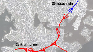 Centrumtunnelplanerna från Hermanstad till Västra Hamnen. Röda och blå streck på en karta på Helsingfors centrum. Strecken visar var Centrumtunneln och Sörnästunneln går.