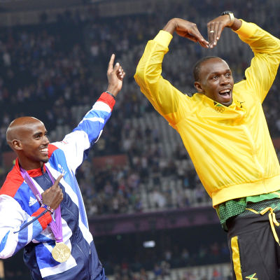 Mo Farah och Usain Bolt poserar.