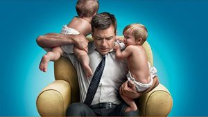 En man och två bebisar. Jason Bateman i The Change-Up. Detalj från filmaffischen "The Change-Up".