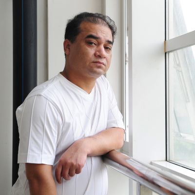 Ilham Tohti kuvattuna Pekingissä, Kiinassa kesäkuussa 2010.