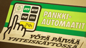 Vanhan pankkiautomaatin ohjetarra, Pankkimuseo.