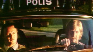 Poliisipartio autossaan Helsingissä kesällä 1975