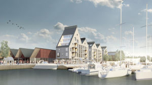 Flervåningshus i förslaget Strandpromenaden. En skiss över ett bostadsområde vid havet. Flervåningshus med träfasad och framför ligger båtar förtöjda vid en brygga.