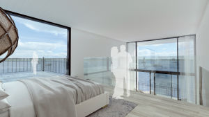 Också bostäderna i förslaget VieW ska ha utsikt över havet. En skiss inifrån ett hus med stora fönster. Utanför skymtar havet.