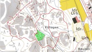 På kartan syns området där terrängbanan får byggas i grönt. En karta på en terräng med motionsbana.