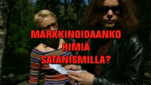 Katja Ståhl ja Ville Valo haastateltavina Poliisi-tv.ssä, kuvan päällä tekstiplanssi