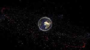 Satelliitteja ja avaruusromua on kauempanakin Maasta. 36 000 kilometrin korkeusdessa oleva geostationaarirata erottuu kuvassa selvästi.