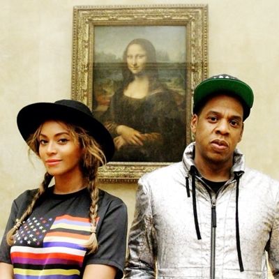 Beyoncé ja Jay-Z Leonardon Mona Lisan edustalla.