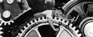 Vetenskap med humor Charlie Chaplin i kugghjulet i filmen Moderna tider.