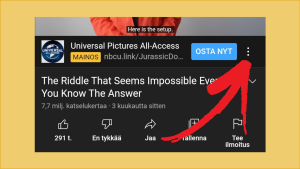 Kuvakaappaus Youtubesta, videon alapuolella näkyy mainos ja korostettuna on 3 pallon valikkokuvake.