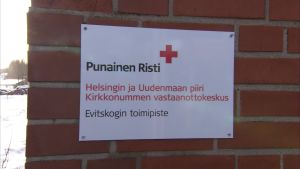 SPR:n Evitskogin vastaanottokeskuksen nimikyltti.