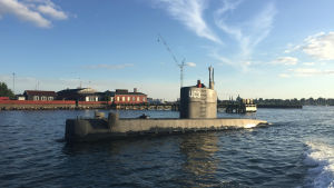 Peter Madsen har själv byggt ubåten Nautilus NC3. Kim Wall och Peter Madsen står i ubåten UC3 Nautilus i Köpenhamns hamn.