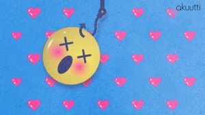 Emoji roikkumassa ongenkoukusta, grafiikka
