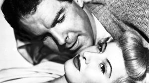Fred macMurray ja Barbara Stanwyck elokuvassa Nainen ilman omaatuntoa (1944).
