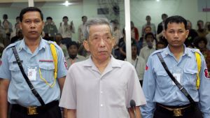 Dhuc, vars riktiga namn är Kang Kek Ieu, är den tredje ur Röda khmerernas ledarskap som har dömts i FN-tribunalen. Han ledde det ökända tortyrcentret S21 i Phnom Phen. Kaing Guek Eav står inför rätta i Kambodja