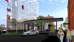 Så här kommer Rostensgatan att se ut i framtiden. En arkitektbild av hur det åtta våningar höga glashuset med tre hörn ska se ut som byggs intill Scandics hotell på Rostensgatan i Vasa. På bilden ser man hur Rostensgatan i princip kommer att stängas av för trafik.
