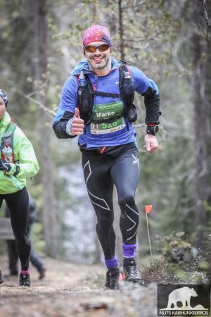 Marko Krapu on juossut toistakymmentä vähintään maratonin pituista polkujuoksukilpailua. Tässä hän taittaa matkaa Karhunkierroksen 53 km:llä viime vuonna. Polkujuoksija Karhunkierroksella