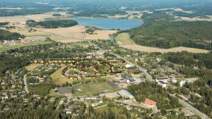 Så här såg planen ut för Sjundeås hjärta 2010. Luftbild visar framtidens kommuncentrum i Sjundeå med det nya området som Asuntosäätiö planerar och förverkligar.
