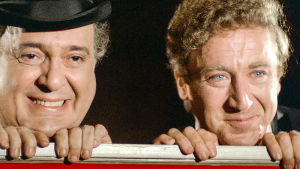 Zero Mostel ja Gene Wilder aikovat pistää flopilla rahoiksi. Zero Mostel ja Gene Wilder pääosissa Mel Brooksin elokuvassa Kevät koittaa Hitlerille (The Producers, 1968).