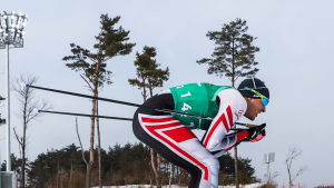 Max Hauke nådde aldrig den absoluta världseliten som senior. Max Hauke fotograferad från sidan i en nedförsbacke