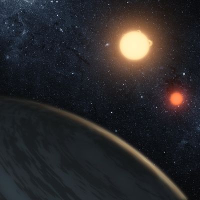 Artistvision av planeten Keplar-16b med två solar.