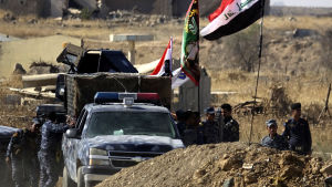 Den irakiska armén har koncentrerat styrkor nära kurdiska områden vid gränsen mellan Syrien och Irak Militär utanför Kirkuk i Irak.