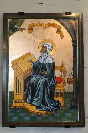 Den heliga Birgitta, som gett Nykarleby kyrka sitt namn, finns även på en målning i kyrkan. Målning av heliga Birgitta klädd i blått med gyllene gloria kring huvudet. Birgitta skriver i en bok och guds hand sänder strålar till den gyllene glorian.
