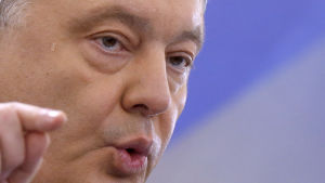 Ukrainas president Petro Porosjenko. Närbild av Ukrainas president Petro Porosjenko som talar under en presskonferens.