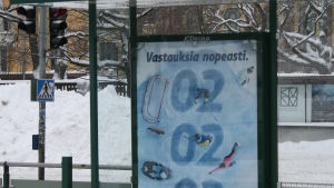 020202 -palvelun mainos Helsingissä tammikuussa 2016.