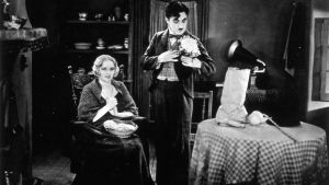 Charles Chaplin ja Virginia Cherrill elokuvassa City Lights v. 1931