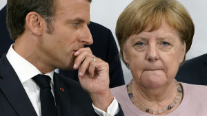 Frankrikes president Emmanuel Macron och Tysklands förbundskansler Angela Merkel fick arbeta hårt för klimattexten i slutdeklarationen Frankrikes president Emmanuel Macron och Tysklands förbundskansler Angela Merkel fick arbeta hårt för klimattexten i slutdeklarationen