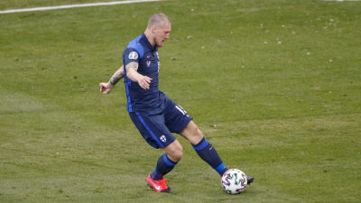 Joni Kauko skjuter.