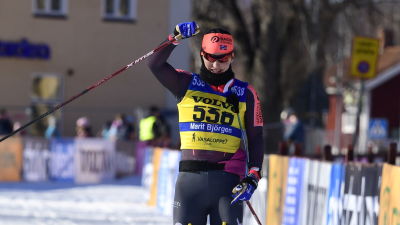Marit Bjørgen jublar på målrakan.